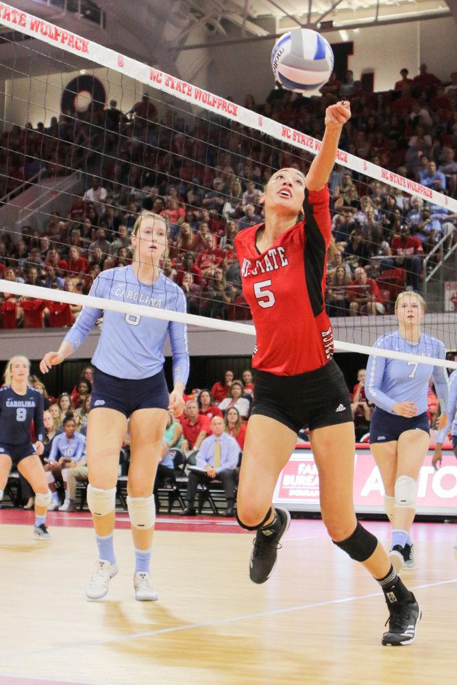 Graduate outside hitter Bree Bailey attempts a save. Bailey had eight kills and three digs during her five sets in which the Wolfpack took down UNC 3-2 in Reynolds Coliseum on Friday, Sept. 22.