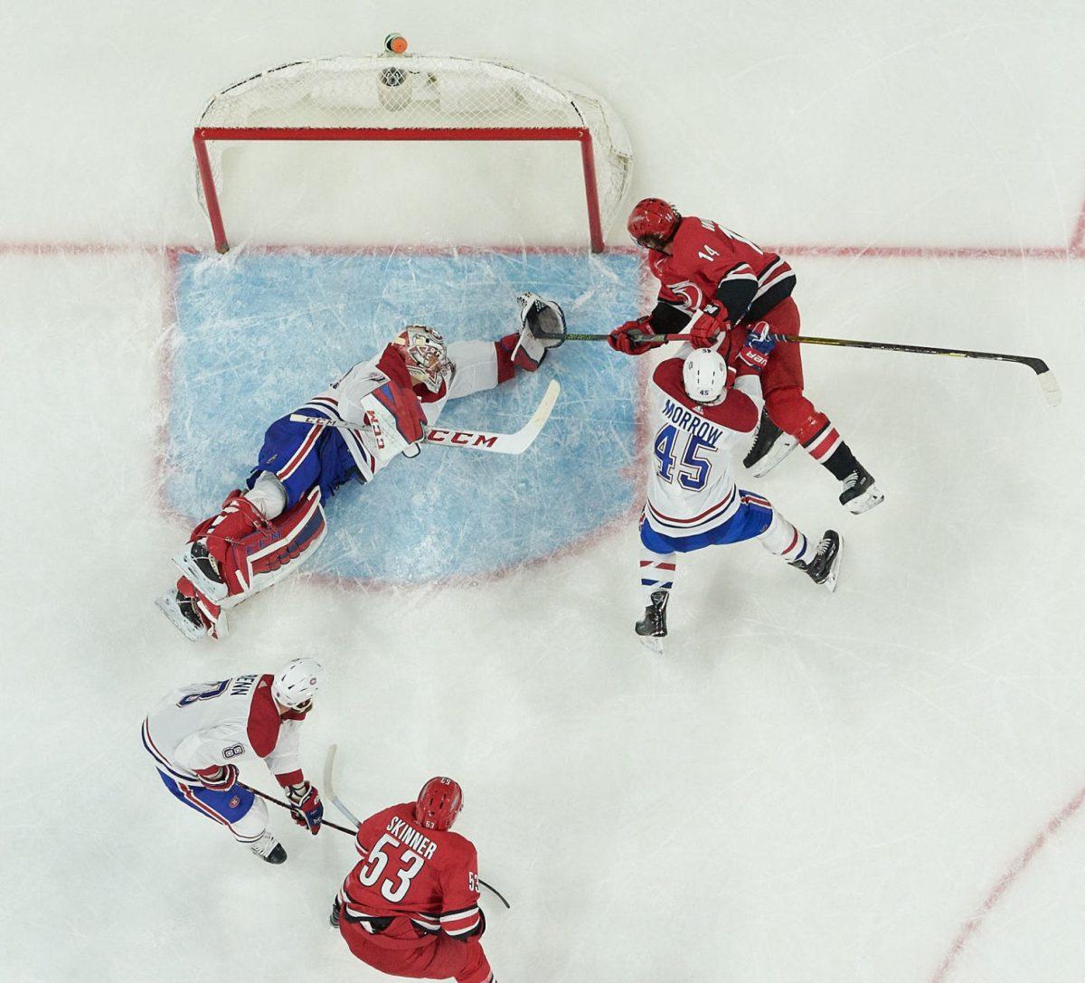 Hurricanes right wing Justin Williams fights Habs goalie Carey Price for the puck in the second period at PNC Arena on Wednesday, Dec. 27 for a 3-1 Canes win. The Canes have now recorded five straight home wins, the longest such streak of the season.