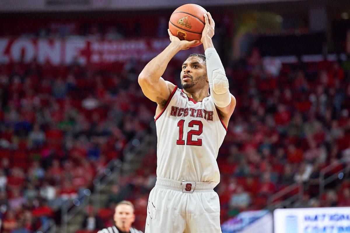 Graduate guard Allerick Freeman goes up for a three point shot against the Jacksonville University Dolphins for a 116-64 win at PNC Arena on Friday, Dec. 22. Freeman led the team with 25 points and the Pack set a record for threes with 19 and points scored.