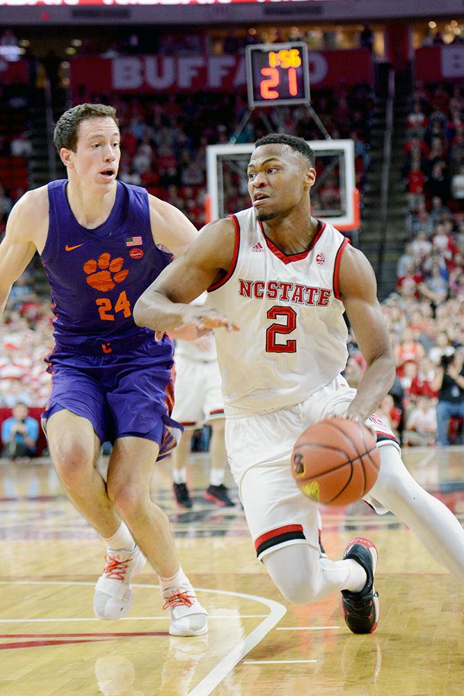 Redshirt junior guard Torin Dorn drives past No. 19 Clemson on Thursday, Jan. 11 at PNC Arena. Dorn scored 9 points, 6 rebounds, 2 assists and 2 steals as the Wolfpack won 78-77 to improve to 12-5 overall and 2-2 in conference play.