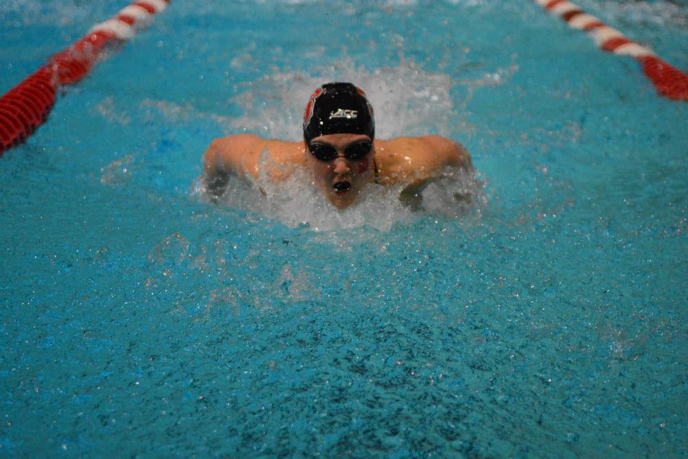 Junior Hannah Moore swims the 200 yard butterfly in the meet against UNC-Chapel Hill at the Willis R. Casey Aquatic Center on Jan. 27, 2017. Moore came in first in the 200 yard butterfly event with the time of 1:59.06. The Wolfpack beat the Tar Heels in 26 of 32 events.