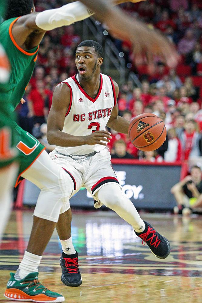 Freshman guard Lavar Batts Jr. looks to make a pass. Batts had 5 points, but led the team in steals with two. The Pack seemed sloppy, committing 15 turnovers during the 86-81 loss to Miami on Thursday, Jan. 21 in PNC Arena.