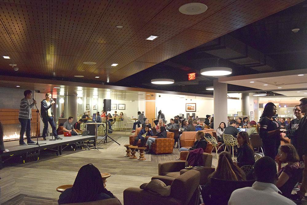 NC State students sing karaoke during the Cultural Exchange Network's global karaoke night in One Earth Lounge Thursday. The club helped organize the event with the Union Activities Board. Karaoke typically happens in Talley once a month in the lounge where students are gathered.