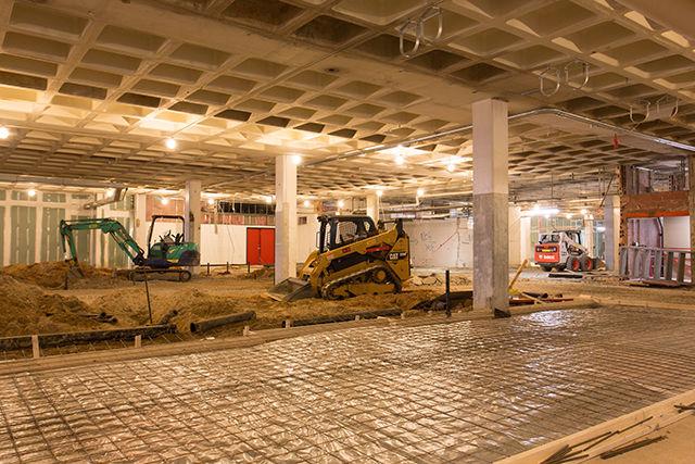 Heavy equipment sits resting in what was once the mens locker room of the Carmicheal Complex. The Carmicheal Addition Project involves a series of renovations with the goal of updating the locker rooms and expanding one of the fitness spaces by 5000 square feet.