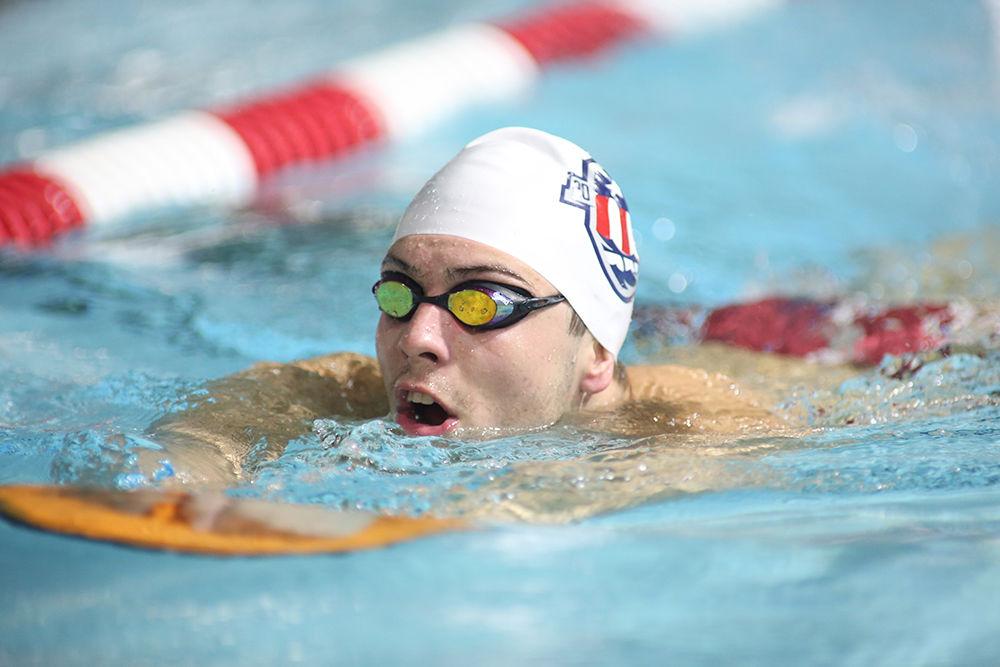 Junior Ryan Held practices his kicking inside of the Willis R. Casey Aquatic Center on July 7, 2016, to prepare for the Olympics. "I've always said I want to go to the Olympics but the dream never really became tangible until about last summer at the U.S. Open when I swam a 49.1 and I was about a top-15 time in the country and then it kind of hit me like ok, actually, you know this could be a reality. I could make the Olympic team,&#8221; Held said. Held won a gold medal for the men's 4x100 freestyle relay.