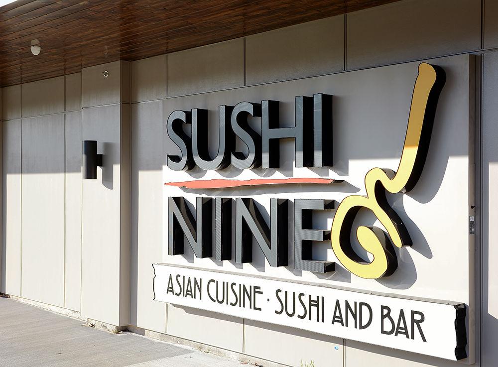 The main sign for restaurant Sushi Nine can be seen from Western Blvd. Sushi Nine recently opened its doors to customers again after the original building burned down in 2016. The new building boasts a larger interior with the same menu as before.