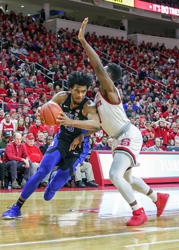 Duke's Marvin Bagley III pushes into the interior despite the opposition from senior forward Abdul-Malik Abu during the 96-85 win over No. 2 Duke in PNC Arena on Jan. 6.