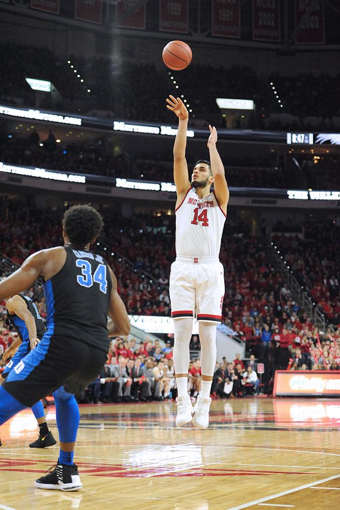 Omer Yurtseven, a sophomore center, shoots a field goal. Yurtseven had 16 points and 9 rebounds on the night. The North Carolina State University mens basketball team caught a win against 4th ranked Duke saturday night 96-85.