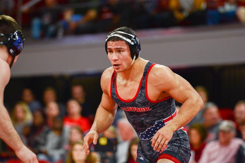 Redshirt junior Michael Macchiavello prepares to wrestle at the top of a period. The NC State wrestling team beat Duke 34-6 in the ACC opener at Reynolds Coliseum on Jan. 11.