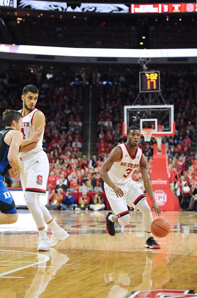 Lavar Batts Jr. a freshman guard, utilizes the pic set by Omer Yurtseven, a sophomore center. The North Carolina State University mens basketball team caught a win against 4th ranked Duke Saturday night 96-85.