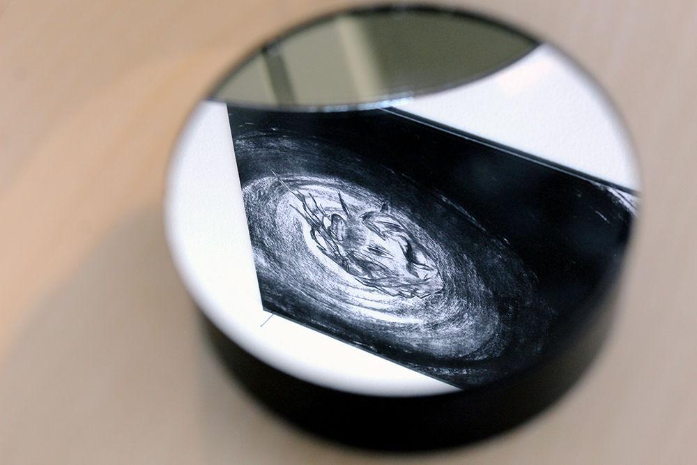 This mirror and drawing are a part of the Ideal Space exhibit, which is an installation by College of Design students. The Ideal Space exhibit is located at the North Carolina Museum of Art and runs through Jan. 25.
