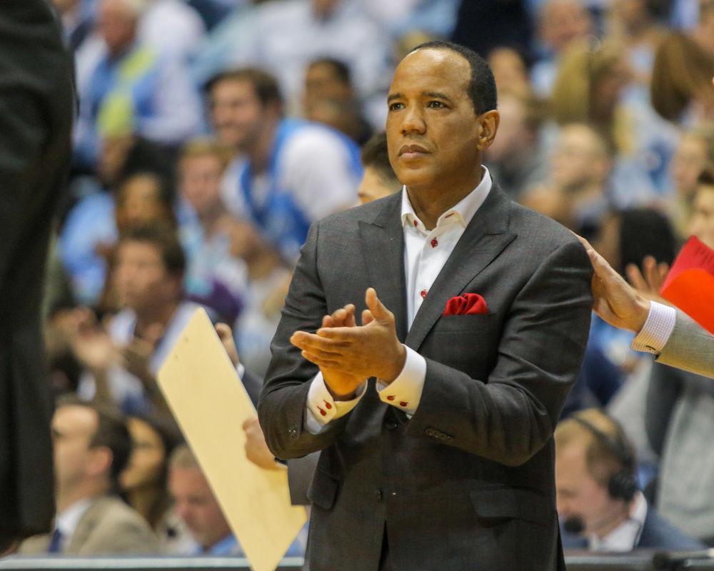 Head coach Kevin Keatts applauds a play during the 95-91 overtime thriller over UNC in the Smith Center on Saturday, Jan. 27.