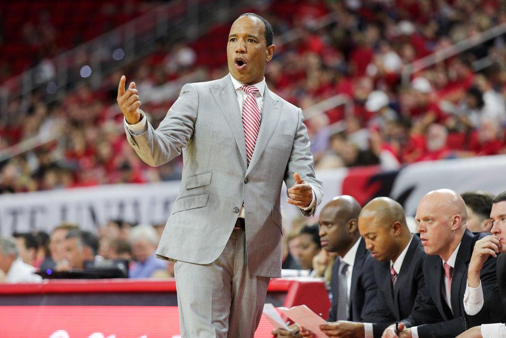 Head coach Kevin Keatts signals to the team. The Wolfpack showed off it's new defense and a high-powered offense with a 109-66 win over Mars Hill on Friday, Nov. 3 in PNC Arena.