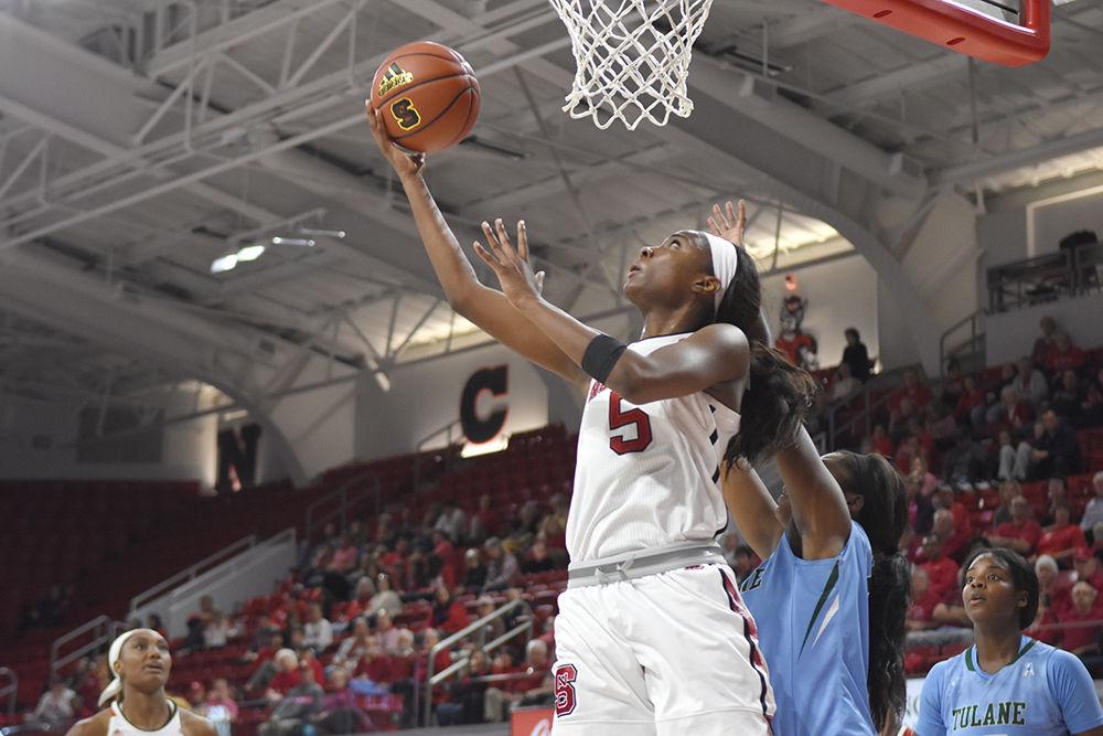 Senior forward Chelsea Nelson makes a layup during NC State's 79-55 win over Tulane on Dec. 3 at Reynolds Coliseum. Nelson contributed 16 points, 3 assists and 8 rebounds as the Wolfpack went into winter break at 7-2.