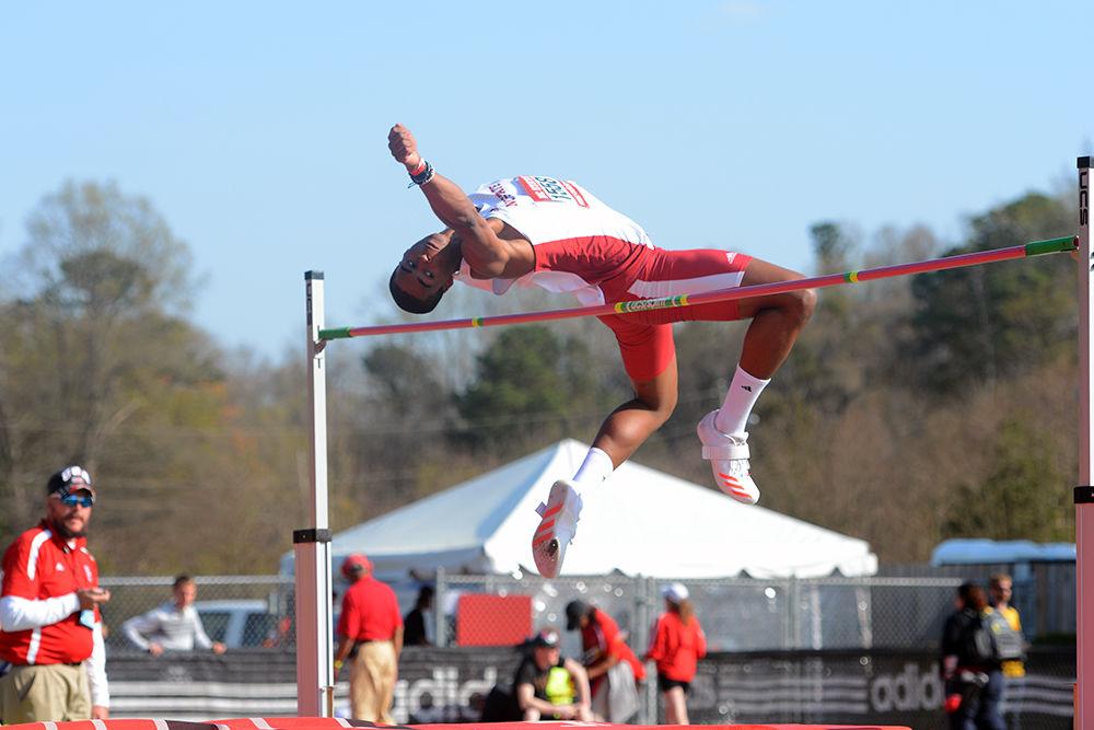 Freshman JaTory Reid looks to clear the bar in the high jump event at the Adidas Raleigh Relays held at Paul Derr Track on Friday, March 24, 2017. Reid went on to win the men's high jump with a jump of six feet, six and three-quarter inches, beating the rest of the field by two inches.