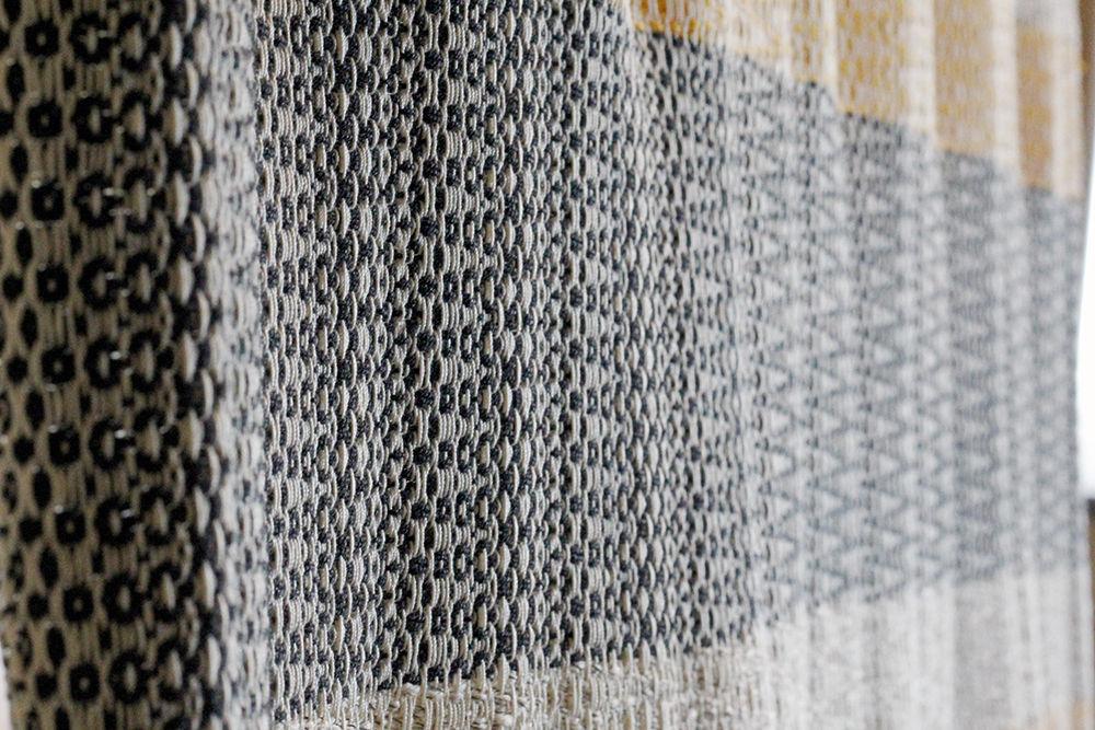 This woven material, made of organic and synthetic threads, was made by fourth-year Olivia Koval studying industrial design. It is a featured piece in the Ideal Space exhibit, which is an installation by College of Design students. The Ideal Space exhibit is located at the North Carolina Museum of Art and runs through Jan. 25.