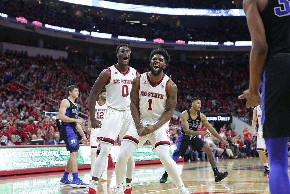 Redshirt senior forward Lennard Freeman and senior forward Abdul-Malik Abu celebrate a dunk during the game against Duke in PNC Arena, Saturday, Jan. 8. Freeman scored 13 points and made 5 of 8 attempted field goals. The Wolfpack won, 96-85.&#160;