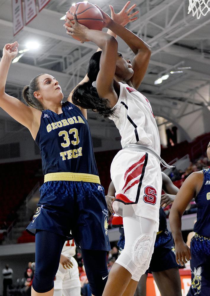 Senior forward Chelsea Nelson attacks the basket against Georgia Tech on Wednesday in Reynolds Coliseum. Nelson led the team with 14 rebounds, along with 11 points and 2 assists. The Wolfpack won 56-43 to improve to a 13-5 record this season.
