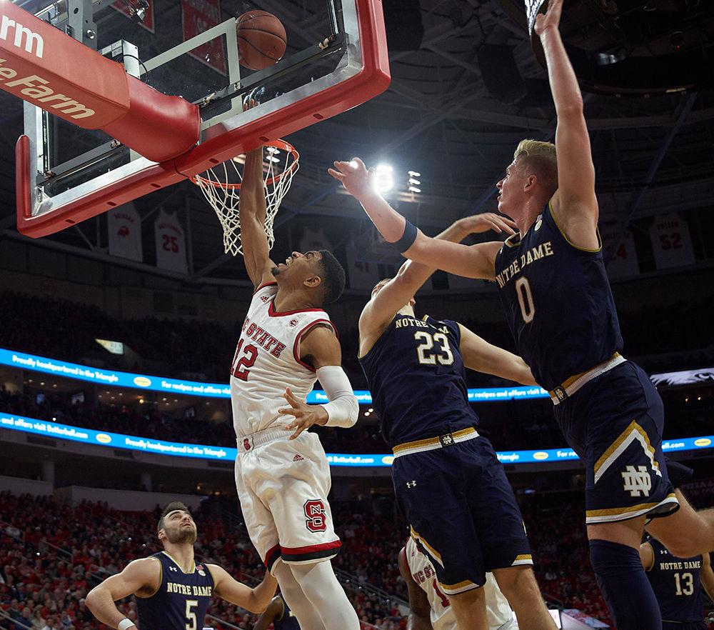 Graduate transfer guard Allerik Freeman pushes in for a layup in the second half against Notre Dame at PNC Arena on Saturday, Feb. 3 for a 76-58 Wolfpack victory. Freeman was 2-4 in field goals in the second half.
