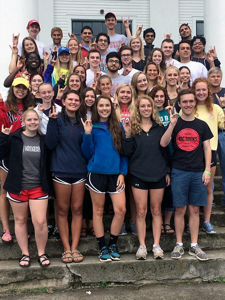 The Park Class of 2021 stand together for a group photo after their freshman retreat on Aug. 11, 2017.