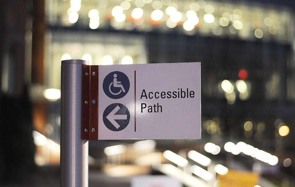 An accessibility sign stands in front of Talley Student Union on Wednesday, Feb. 28. These signs are important for showing people an alternative path to take to access major campus buildings.