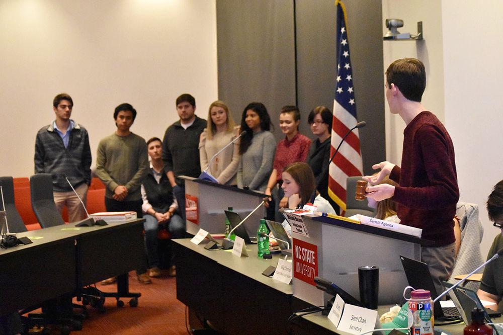 Mitchell Moravec, a fourth-year studying material science and psychology, and Student Senate President, introduces new senate members in Talley Student Union on Wednesday. Seven new senators were appointed during the meeting.