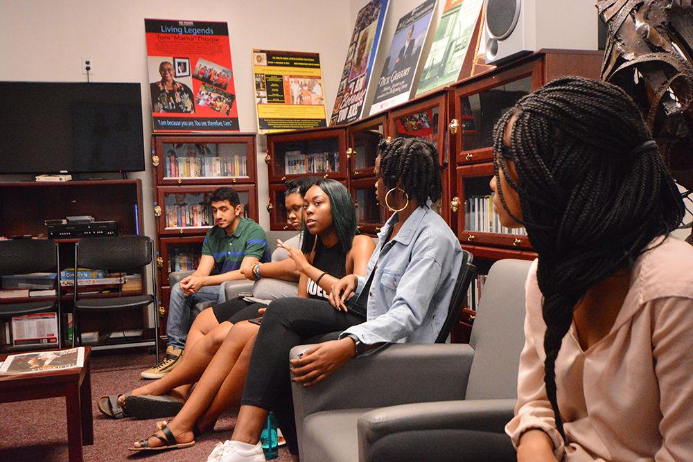 Naomi Ejim, a fourth-year student studying interdisciplinary studies and genetics, expresses herself during What's on the Table in the African American Cultural Center Living Room. What's on the Table is a bi-weekly meet-up held for members of the NC State Community to share perspective, provide support and discuss pressing issues in a safe environment.