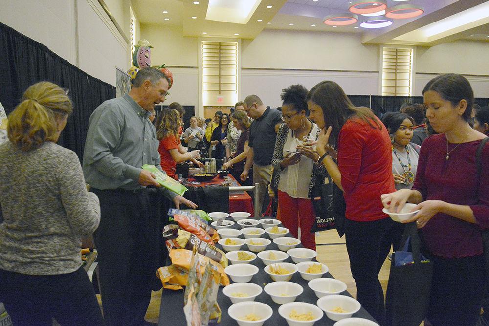 Snyder's Lance offers various healthy gluten-free snacks for NC State students, faculty and staff to taste during the Wellness Fair on Wednesday in Talley State Ballroom. Snyder's Lance provided snacks that taste the same but are healthier for you because they are organic and GMO-free.