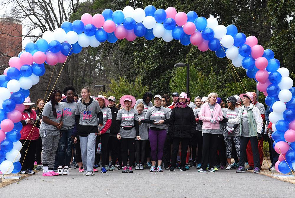 Runners line up at the starting line at the 2nd Annual Kay Yow Celebration Run/Walk at NC State University's Stafford Commons on Saturday. The Kay Yow Celebration Run/Walk was started in 2017 order to support women and families who are battling cancer and fund research to end cancer.&#160;