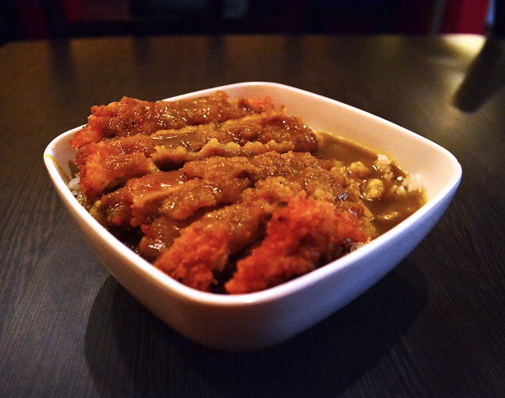 A serving of chicken curry rests on a bed of rice from Oishi Japanese Restaurant on Hillsborough Street on Feb. 5. The restaurant is open daily till 9 p.m. and offers a variety of Asian foods, such as noodles, fried rice and sushi.