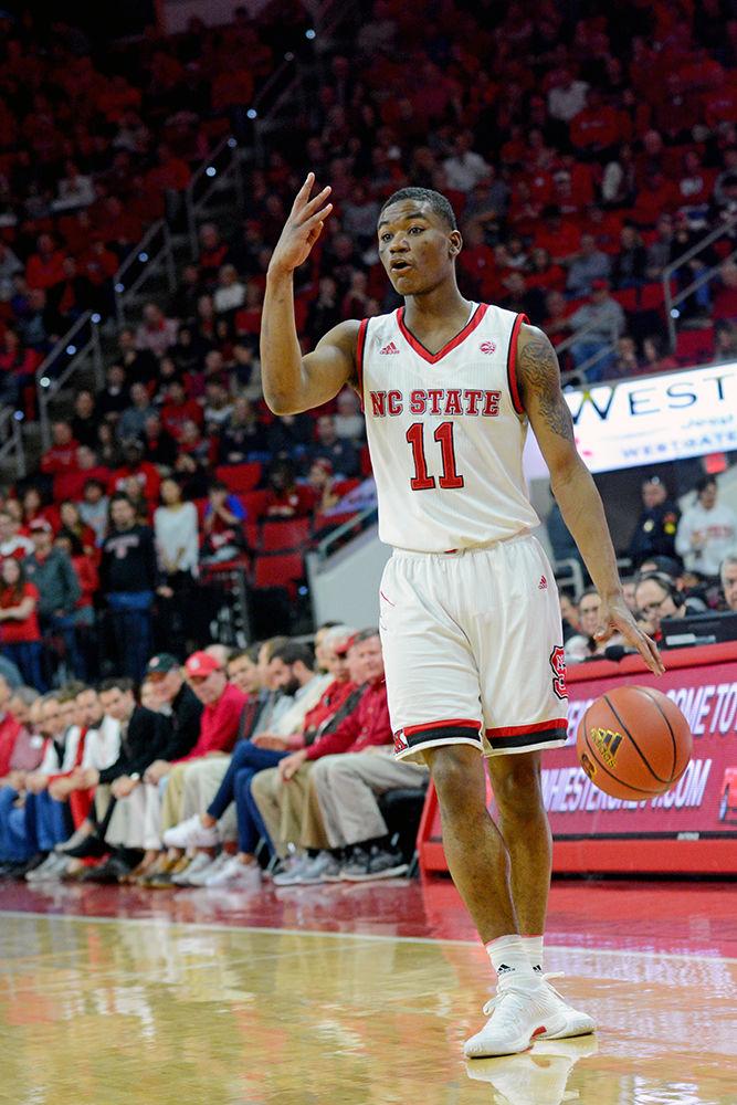 Sophomore point guard Markell Johnson directs the NC State offense during their 76-58 win over Notre Dame on Saturday at PNC Arena. Johnson scored 5 points and 6 rebounds. With 10 assists, Johnson became the first player in school history to record double-digit assists in four consecutive games.