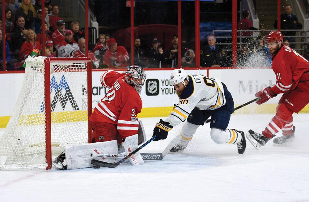 Hurricanes goalie Cam Ward stops a shot by Sabres forward Ryan O'Reilly on Jan. 13, 2017 in PNC Arena. Ward made 36 saves in the Hurricanes 5-2 victory over Buffalo. The win also marked Ward's 600th game in the NHL, all of which he played for the Hurricanes.&#160;
