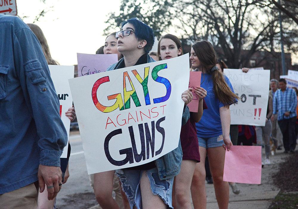Toby Miller, a junior at Enloe High School participates in the recent Student's March on the Capitol. She stood among the crowd with her sign, spreading the message that "We need to speak out so our lives aren't next,". The march took place as a reaction to the recent Florida school shooting.