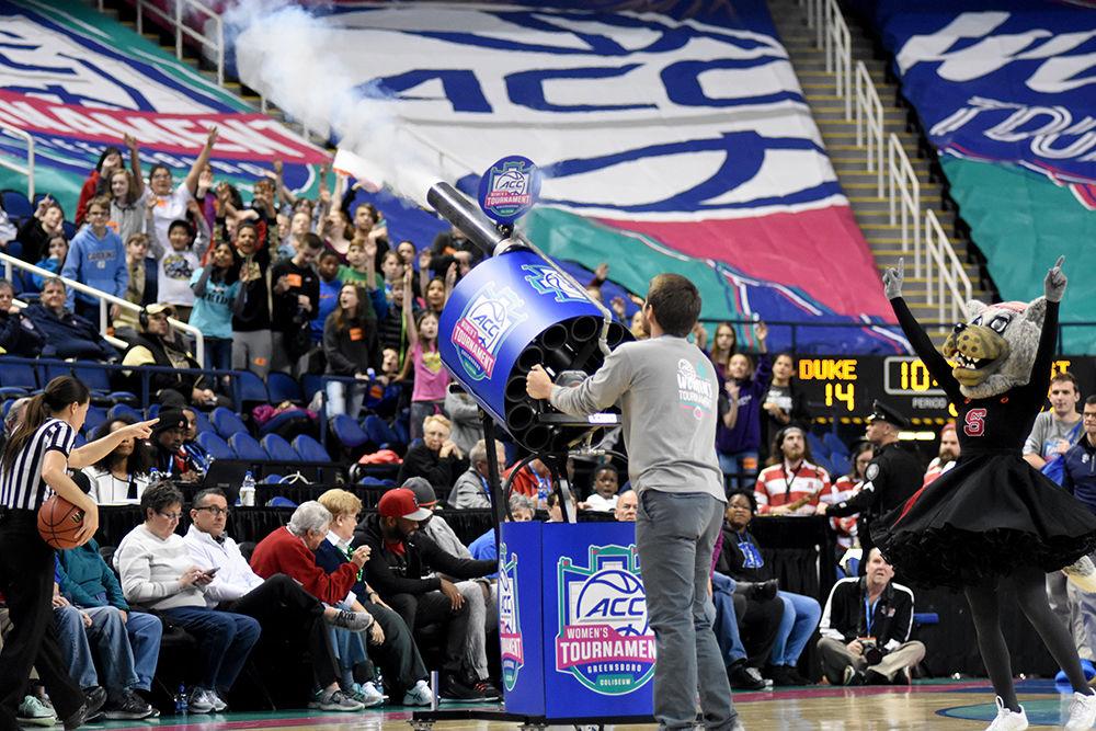 A tee shirt cannon is fired at the crowd attending the N.C. State ACC women's basketball quarterfinal against Duke University in Greensboro Coliseum on Friday, Mar. 2, 2018. The Wolfpack won over the Blue Devils with a final score of 51-45.