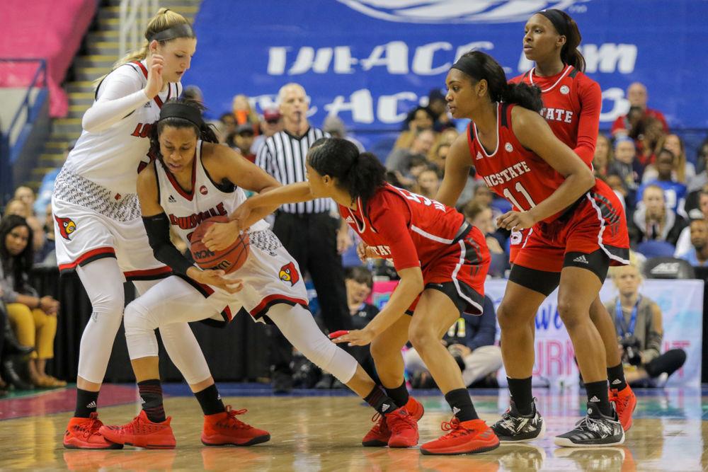 Redshirt junior guard Armani Hawkins fouls to stop the clock. Hawkins had five points in her eight minutes of play. The Wolfpack fell in a hard-fought game 64-59 to No. 4 Louisville on Saturday, March 3 in Greensboro Coliseum.