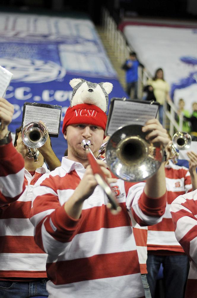 N.C. State pep band members play pep tunes during the ACC women's basketball quarterfinal against Duke University in Greensboro Coliseum on Friday, Mar. 2, 2018. The Wolfpack won against the Blue Devils with a final score of 51-45