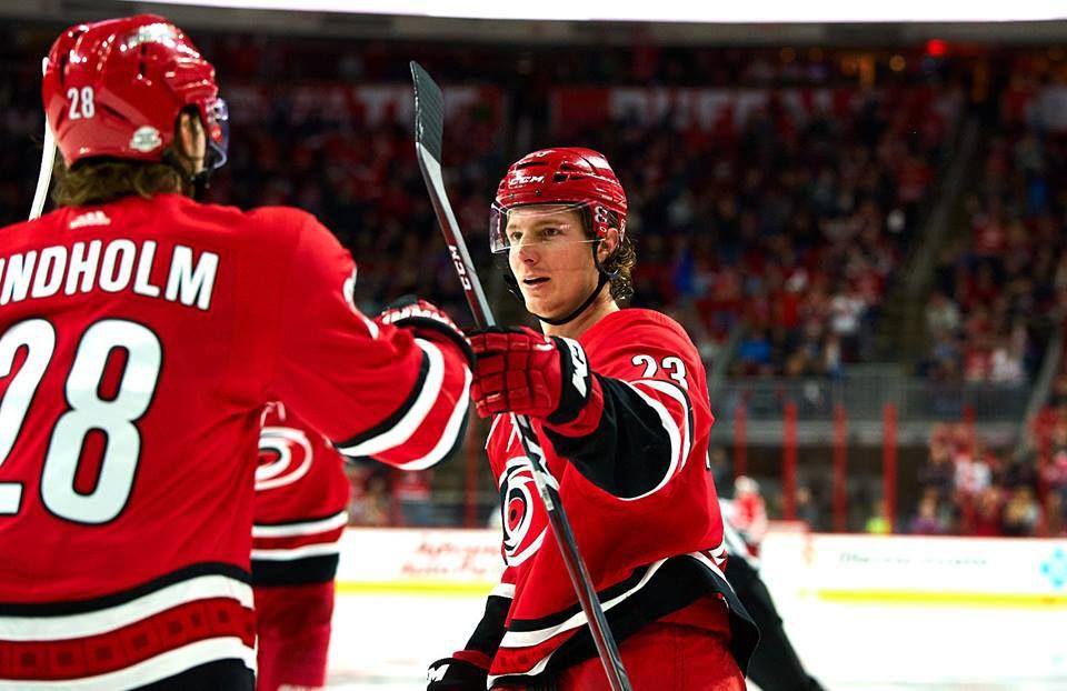 Canes left wing Brock McGinn fist bumps center Elias Lindholm after McGinn scored 35 seconds into the third period at PNC Arena on Saturday February 10 during a 3-1 Hurricanes Victory. McGinn scored two goals against the Avalanche.&#160;
