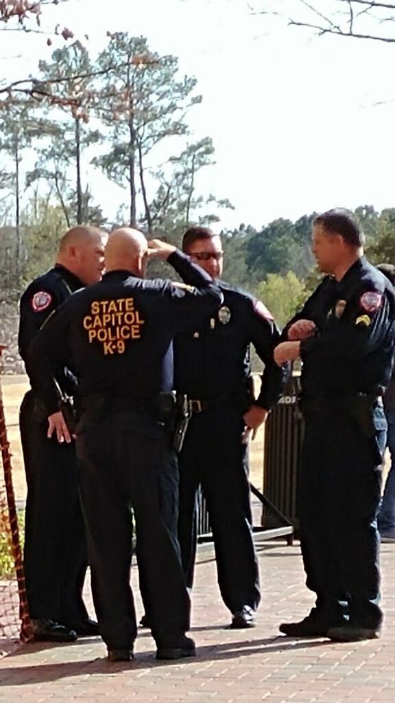 University Police stand outside Engineering Building II. A package found inside the building was determined not to be explosive or a concern.&#160;