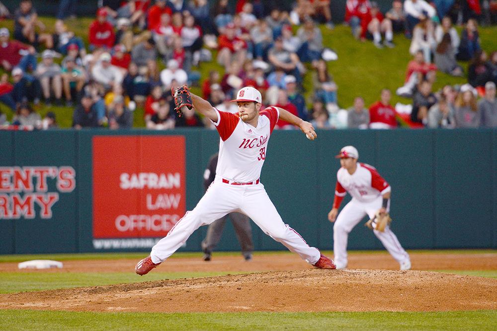 Junior lefthand pitcher Brian Brown throws a pitch at the baseball game against Florida State on Saturday April 8, 2017. Wolfpack won 8-4 at Doak Field.