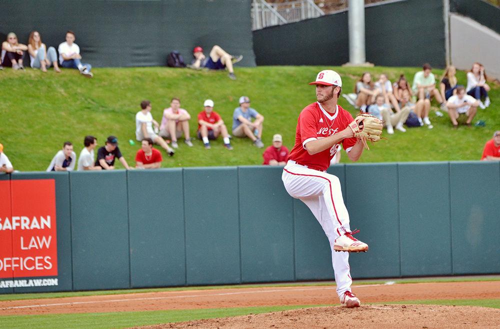 Nick Swiney, a freshman pitcher, winds up for a pitch against UNC-Charlotte in Doak Field at Dail Park on Wednesday. The Wolfpack beat the 49ers 9-6 for their fourth win this season.
