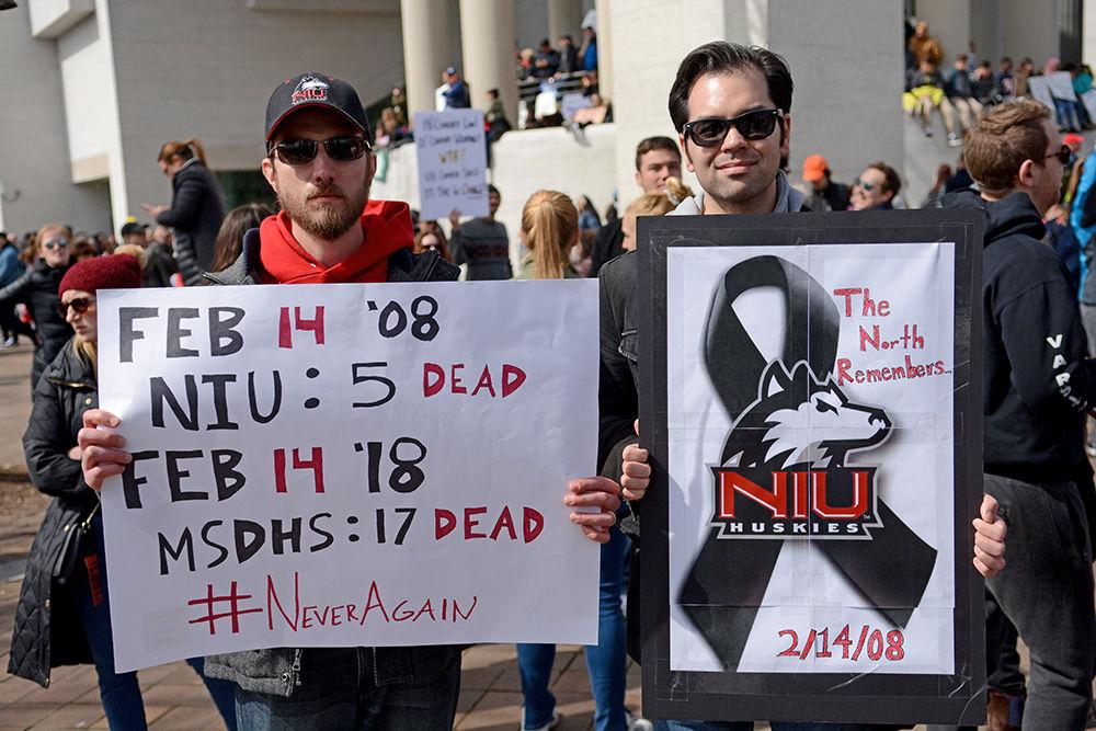 Aaron Haverty, 34, from Memphis, Tennessee and James Tschirhart, 32, from Chicago, Illinois attended the Washington D.C. March for Our Lives event on March 24. Haverty and Tschirhart both attended Northern Illinois University and survived the 2008 school shooting at their alma mater, which killed five students and injured 17 other people.