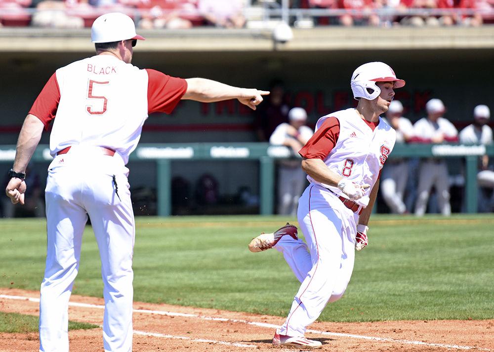 Freshman second baseman Will Wilson rounds first towards second base after hitting a line drive through the infield in the Wolfpack's game against Florida State on April 9, 2017. Wilson ran for a double on the play and had two hits and two RBIs in the 8-4 win at Doak Field.