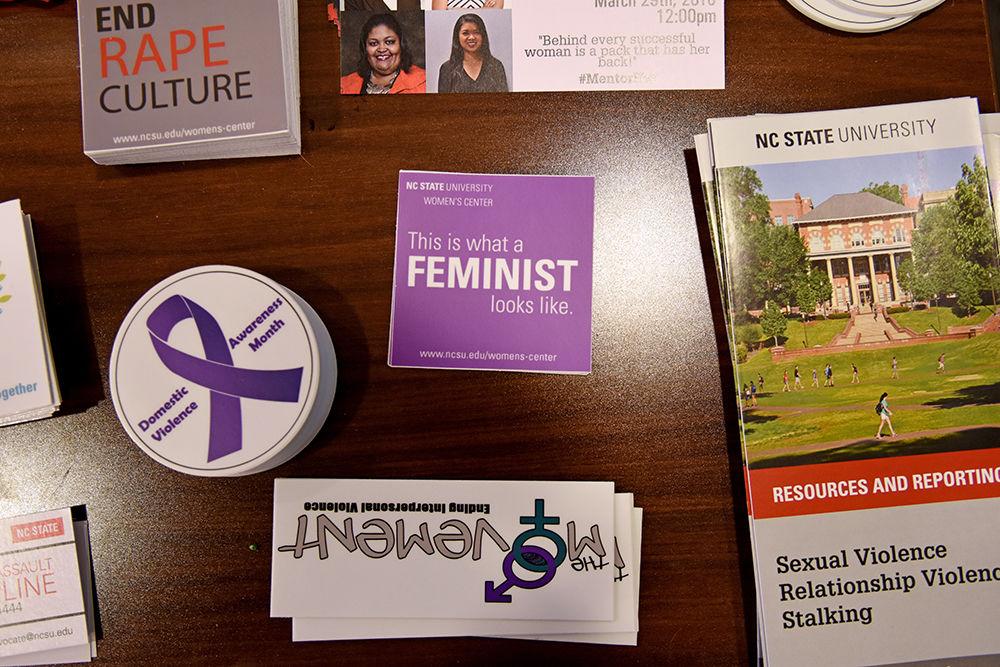Stickers and pamphlets sit on a table in the Women's Center on Wednesday, March 14. The Women's Center and the Office for Institutional Equity and Diversity (OIED) are hosting events for Women's Herstory Month until April 2. According to OIED, the events examine "the ways that women have impacted our past and present and how history has shaped women&#8217;s issues of today."