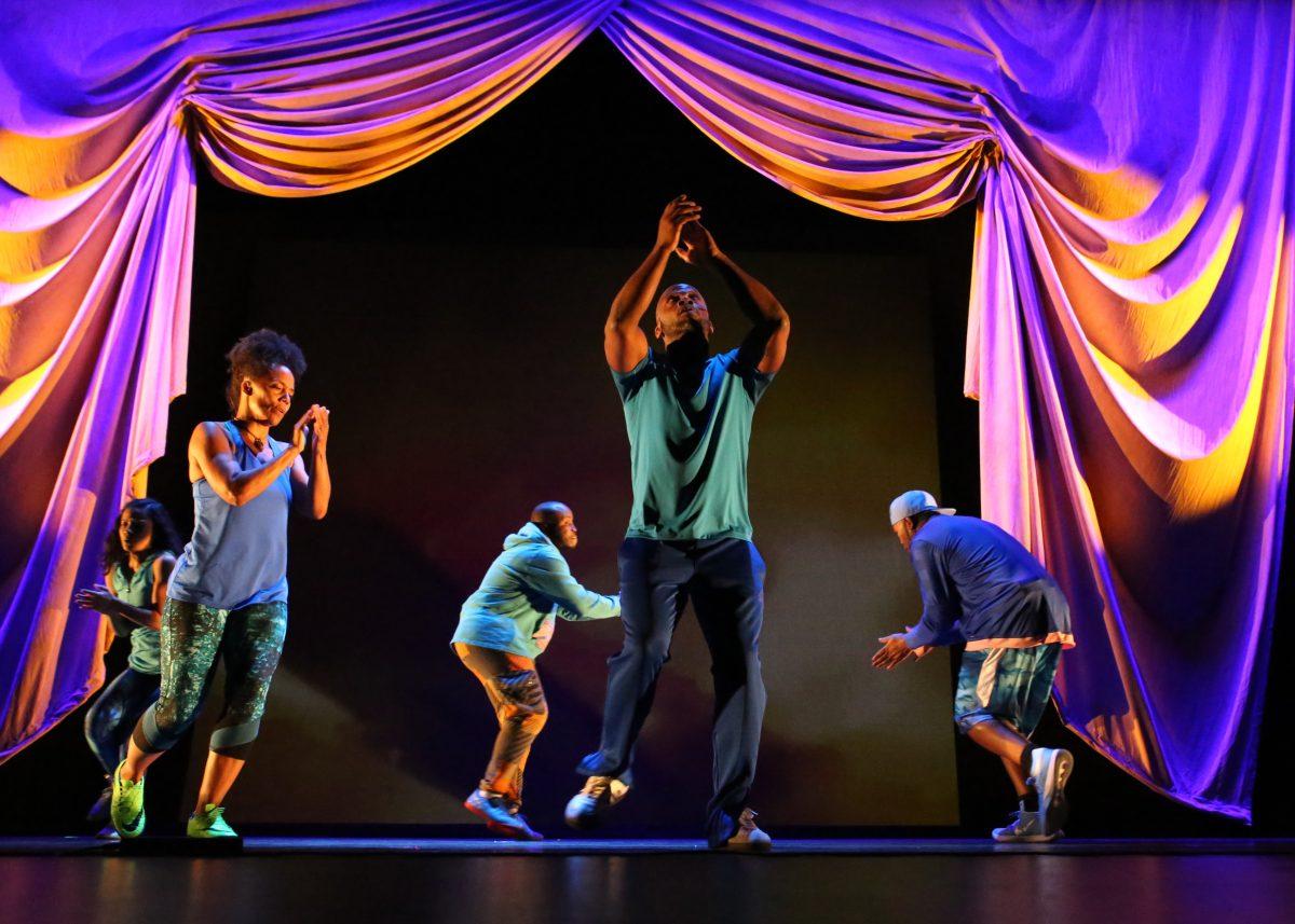 Members of The Living World Project tackle social issues through dance, poetry and soccer in Stewart Theatre on March, 28, 2018.