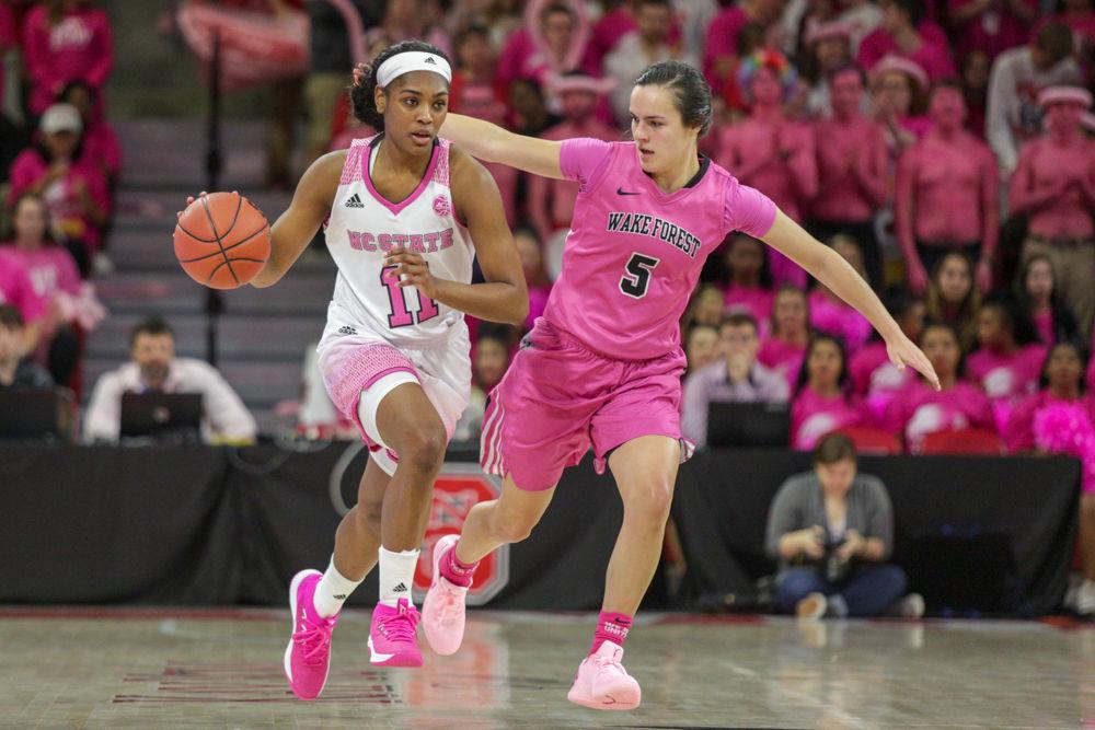 Redshirt junior guard Kiara Leslie brings the ball up court during the 74-61 win of the Play4Kay game on Sunday, Feb. 18 in Reynolds Coliseum.