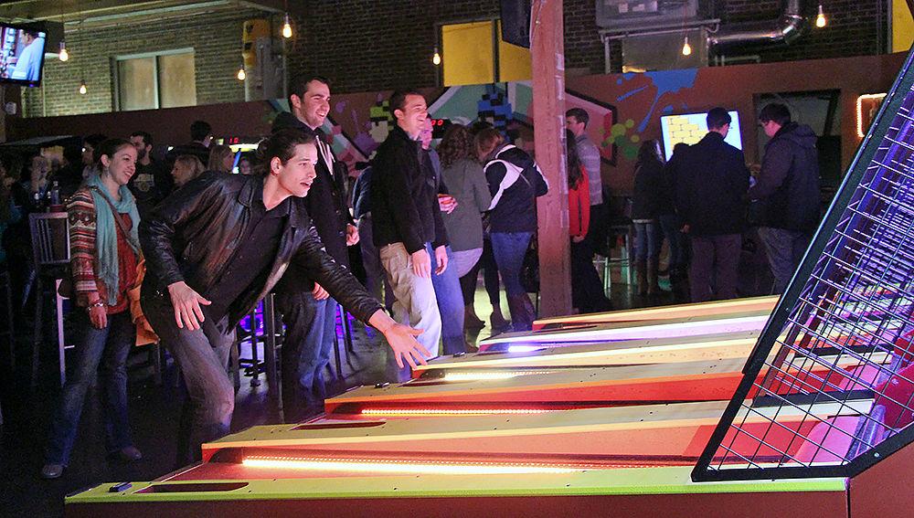 Michael Rountree, a resident of Durham, plays skee-ball at the Boxcar Bar + Arcade on Feb. 21. The customers at this bar not only get to enjoy an occasional drink on a weekend with friends, but also get to revisit their childhood by playing different games.