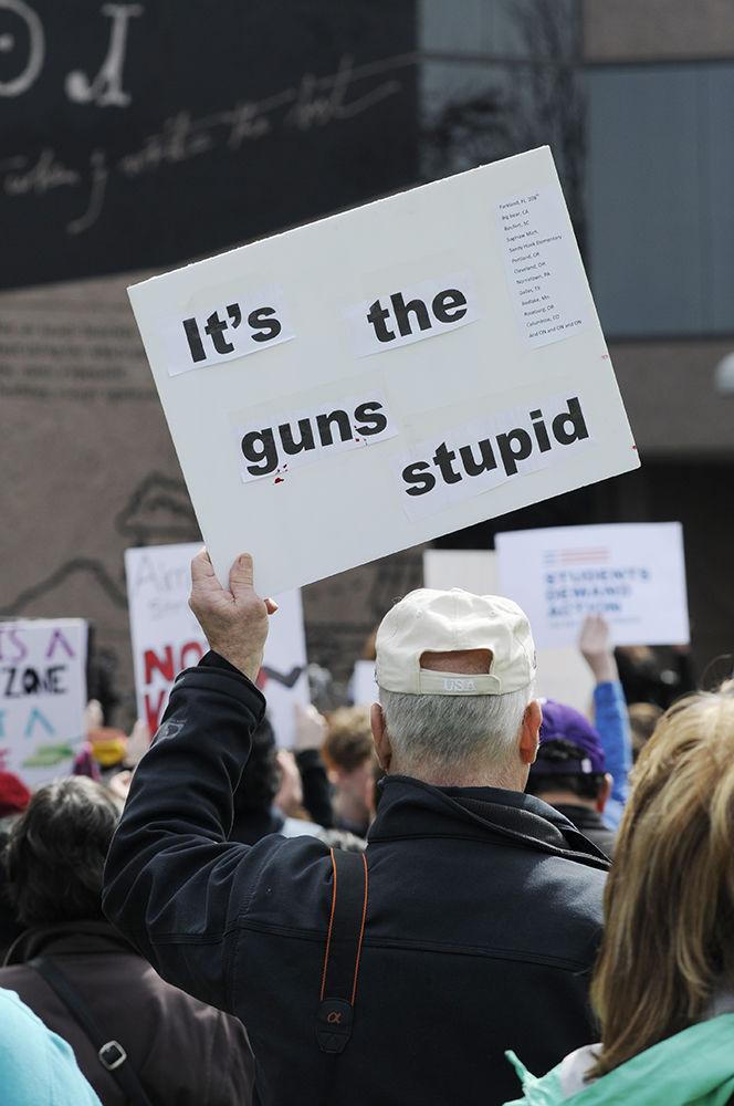 Protesters hold up signs on Halifax mall at the "March for Our Lives" in downtown Raleigh on Saturday, March. 24, 2017. The protest called for "common sense gun reform" in the wake of the multitude of mass shootings that have taken place in the United States school system.