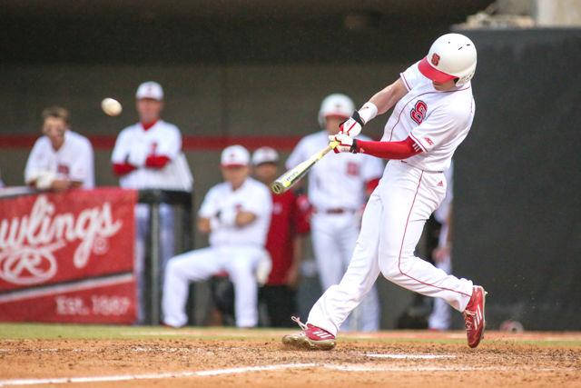 Freshman outfielder Brett Kinneman hits a homer to right center during the fourth inning on May 20, 2016 at Doak Field. Kinneman had two at bats, one of which resulted in the homer with two runners batted in. The Pack lost to UNC 16-4 but won the series 2-1 overall.