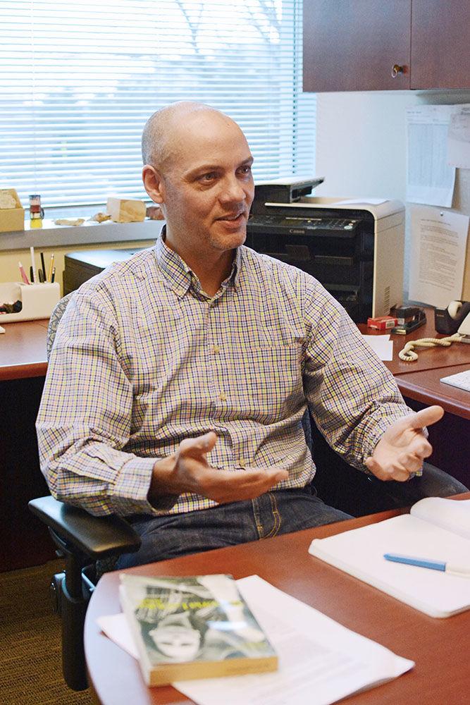 Ryan Emanuel, an associate professor within the College of Natural Resources and a member of the Lumbee Tribe, talks about the planned Atlantic Coast Pipeline while in his office in Jordan Hall Addition on Thursday Feb. 18. If completely approved, the natural gas pipeline will start in West Virginia and run through Virginia and into eastern North Carolina. According to Emanuel, the addition of the pipeline would adversely affect nearby low-income residents, especially people of color and Native Americans.