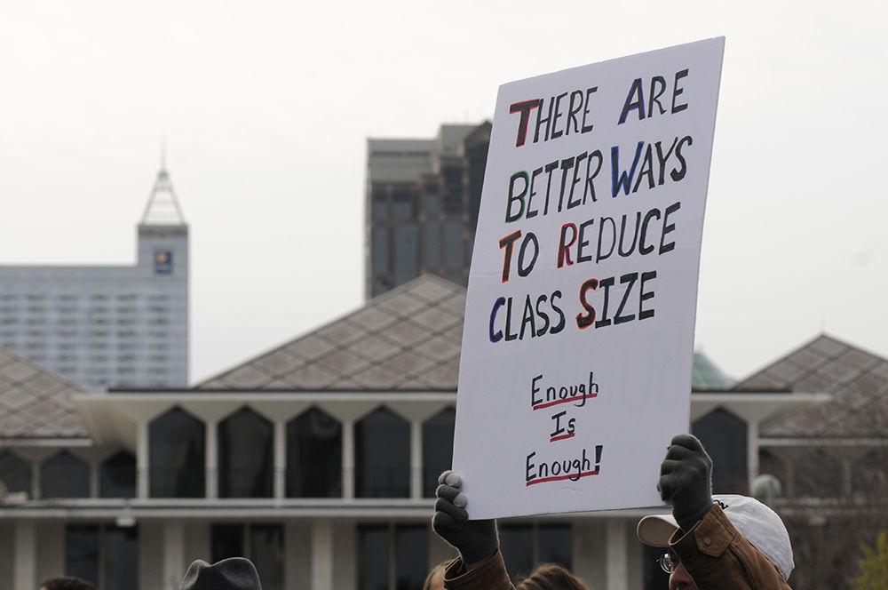 Protesters hold up signs on Halifax mall at the "March for Our Lives" in downtown Raleigh on Saturday, March. 24, 2017. The protest called for "common sense gun reform" in the wake of the multitude of mass shootings that have taken place in the United States school system.